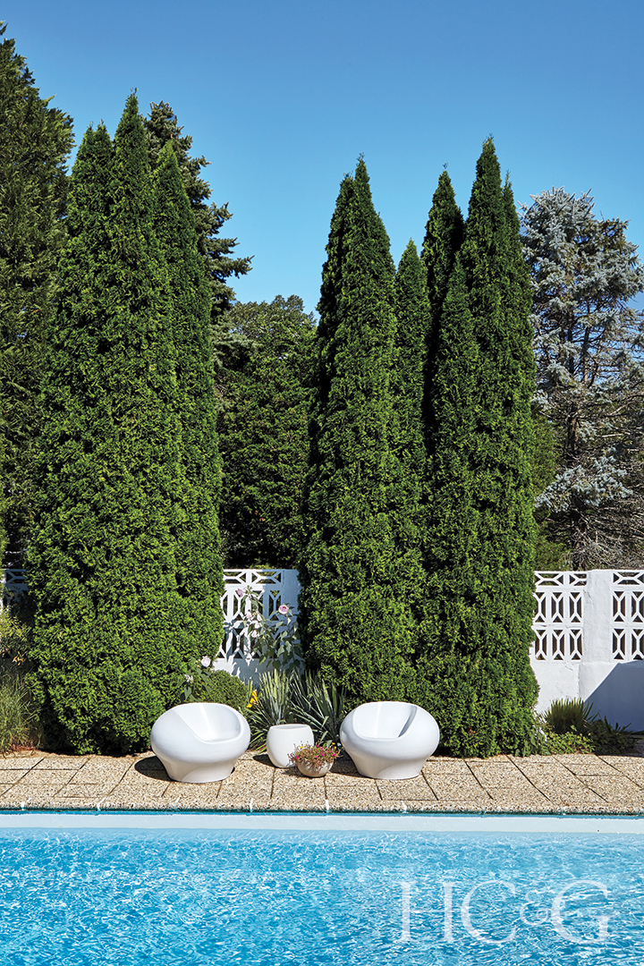 Vintage Fiberglass Chairs Next to Pool