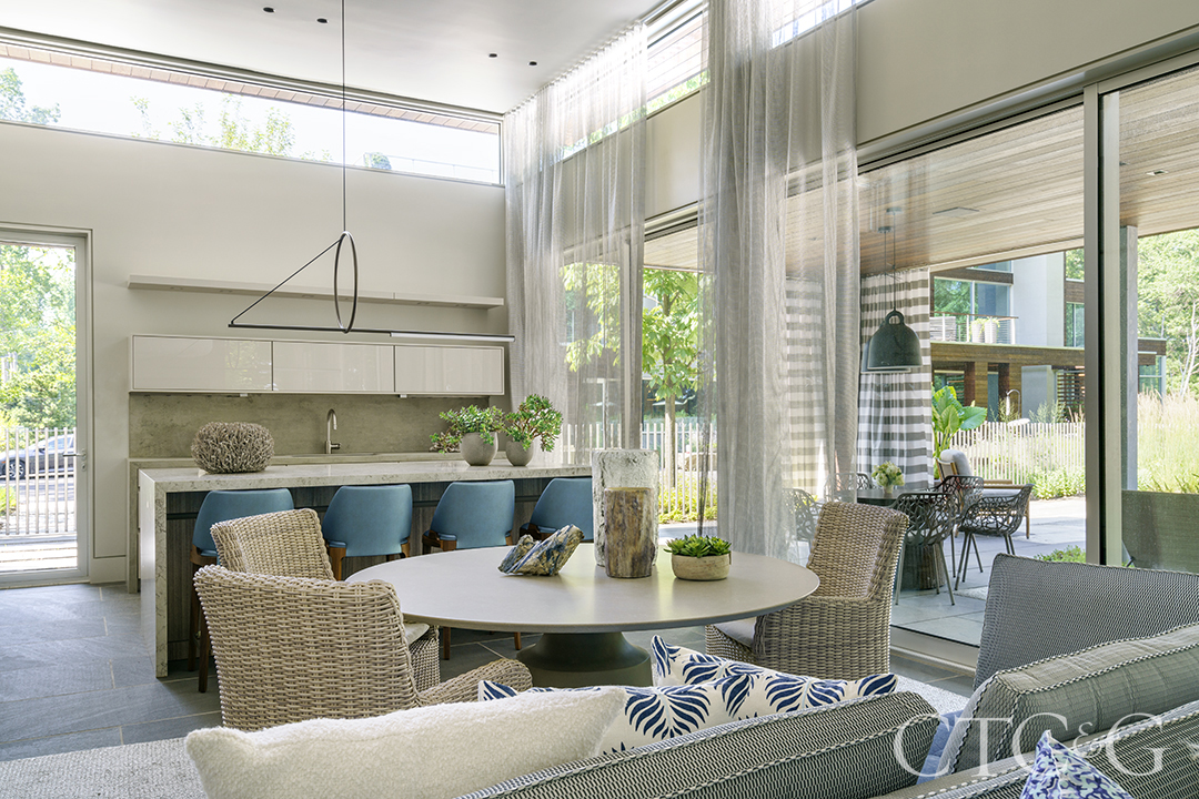 indoor outdoor living kitchen and table and chairs