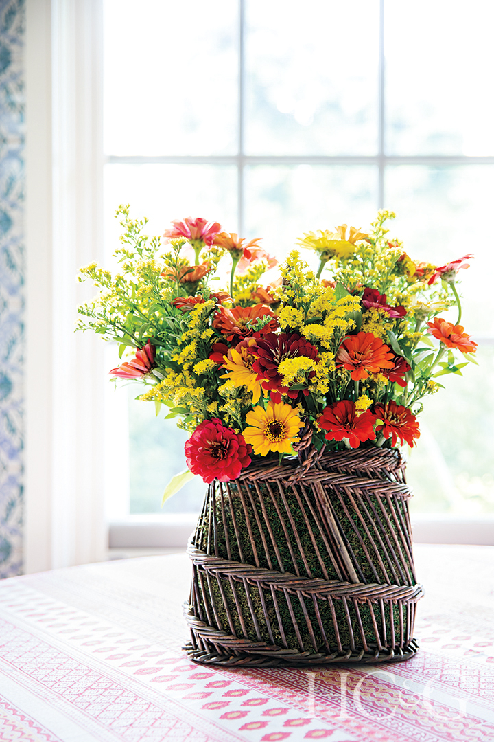 Bright Flower Arrangement In Handmade Vase