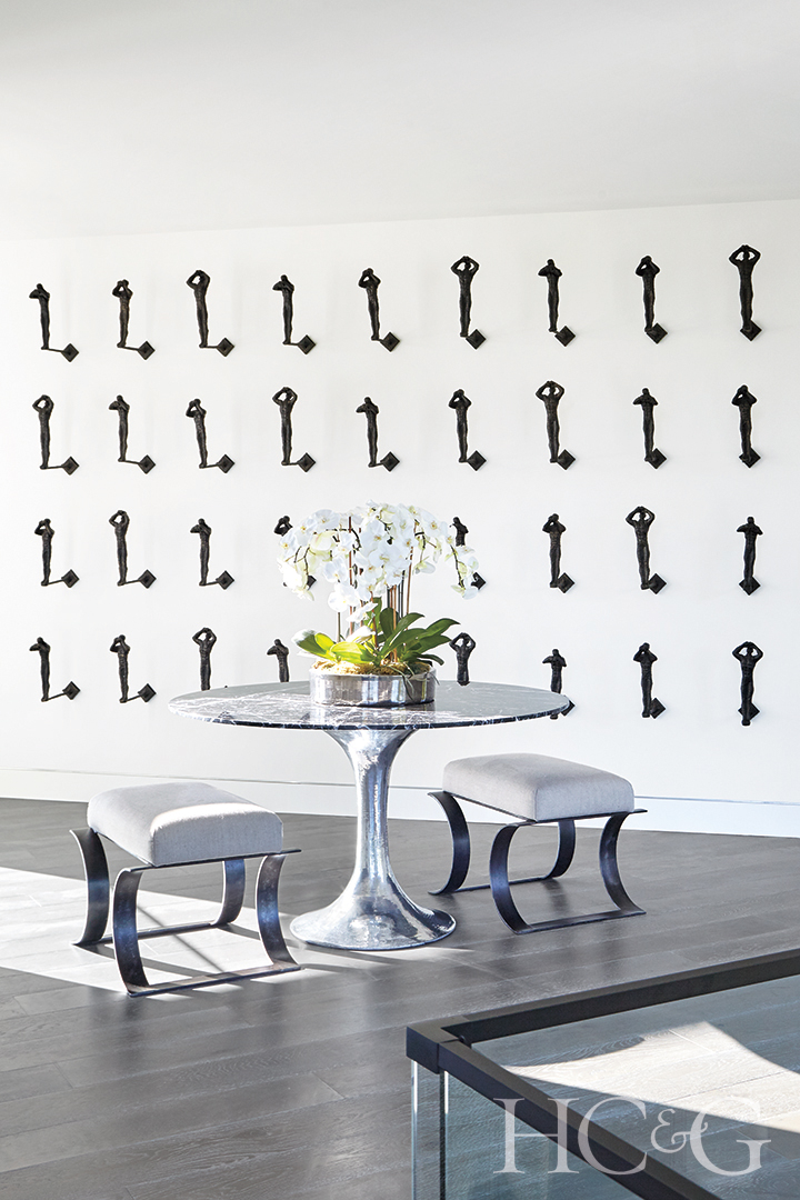 wall-mounted sculptures; nickel and marble table