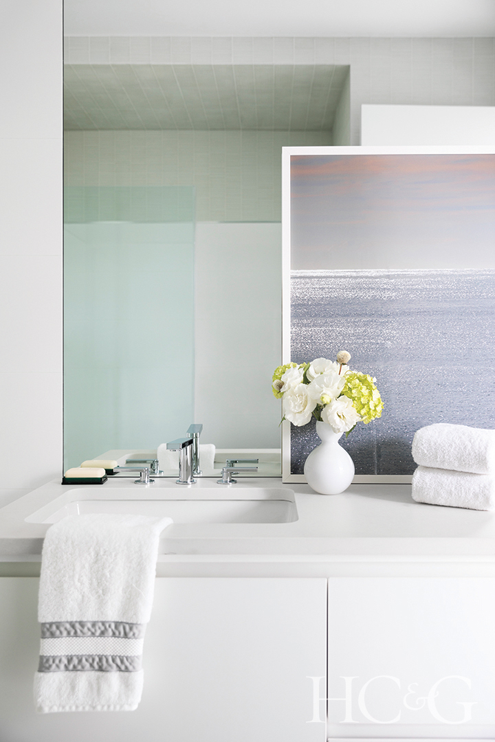 guest bath vanity; floral arrangement