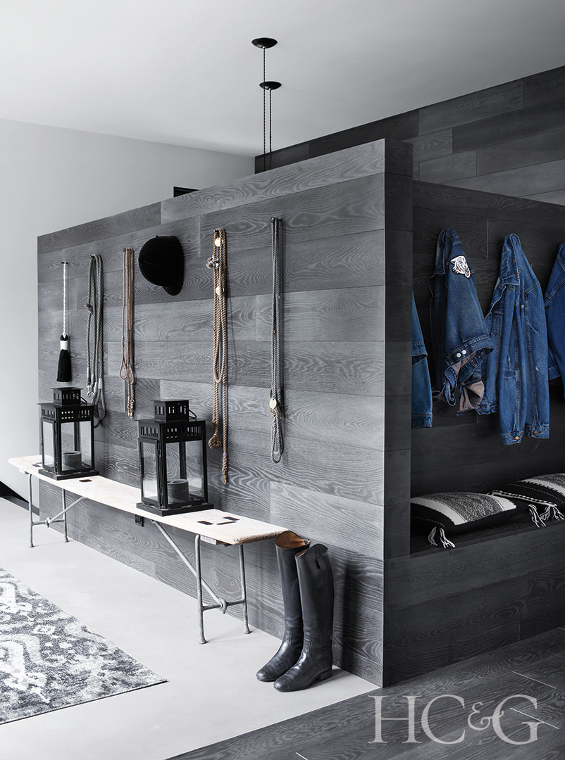 lanterns in entry; black and white rug