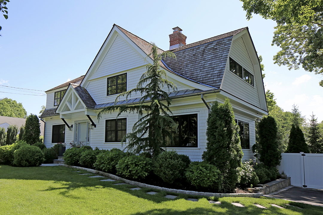 A Design Couple Revamps Their 1940s Dutch Gambrel Exterior