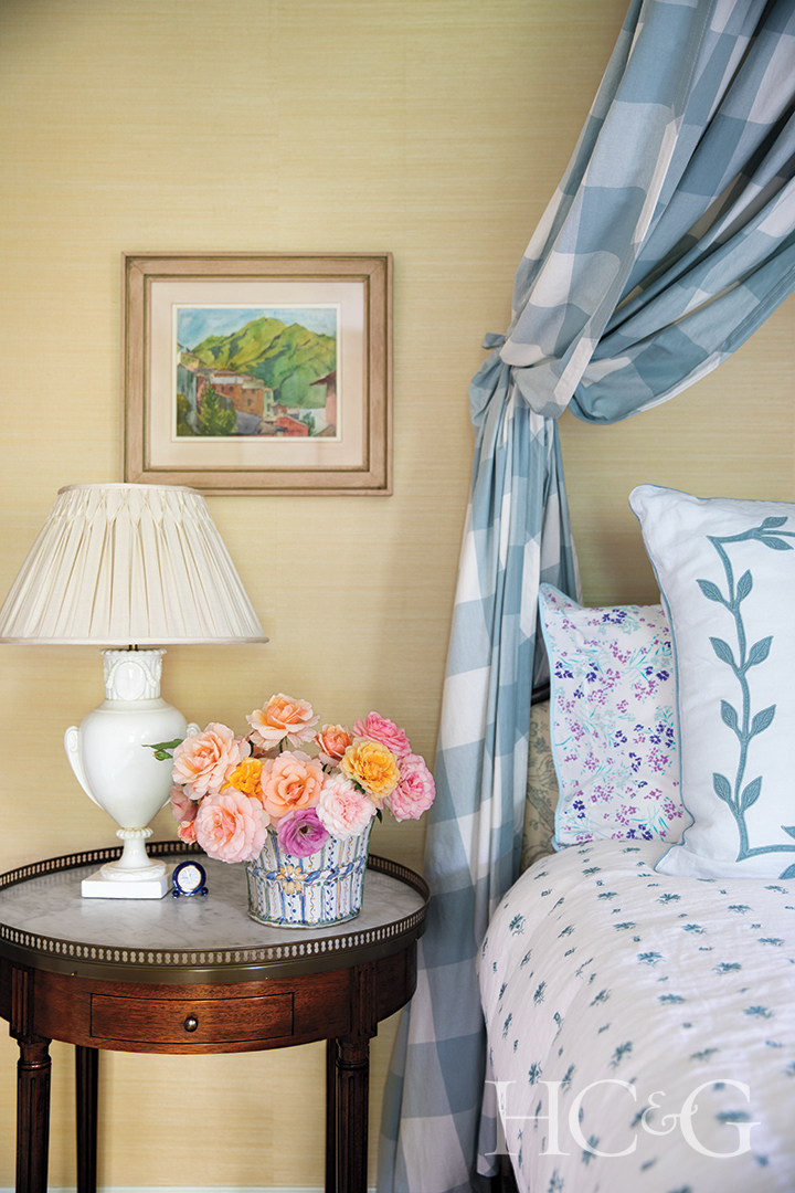 Nightstand With Lamp And Flower Arrangements Bed Canopy