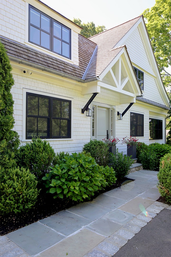 A Design Couple Revamps Their 1940s Dutch Gambrel Entry