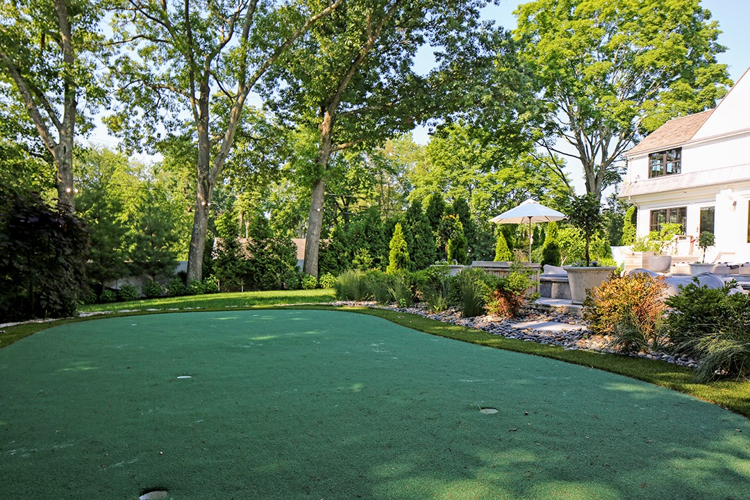 A Design Couple Revamps Their 1940s Dutch Gambrel Putting Green