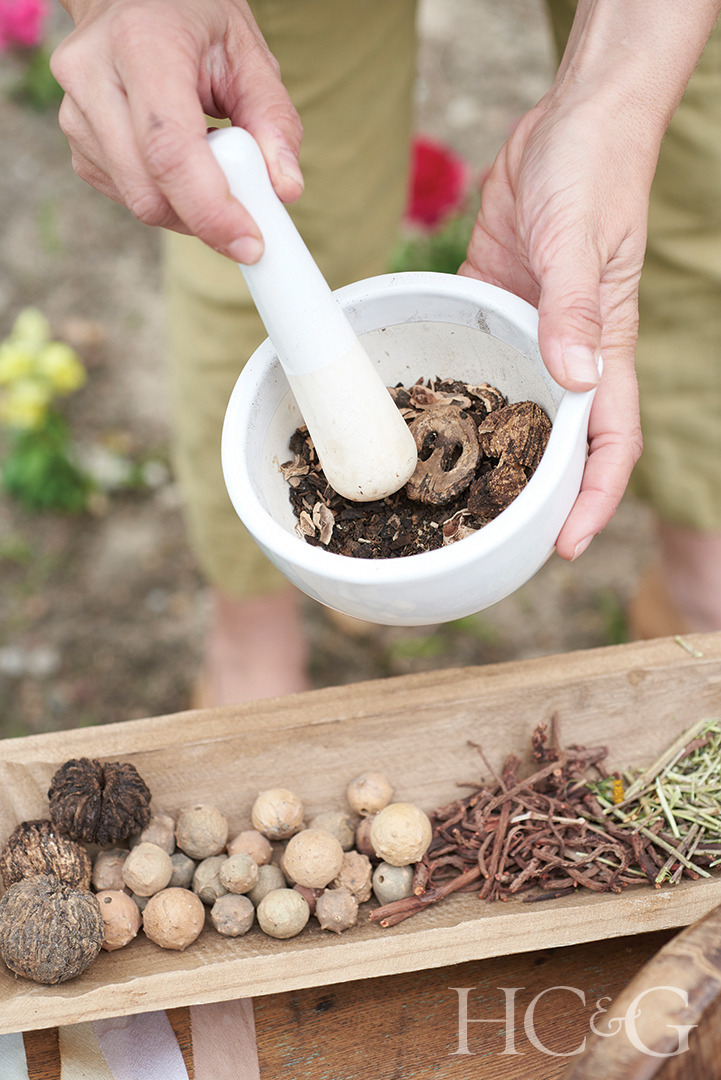 Grinding Herbs In Mortar And Pestle