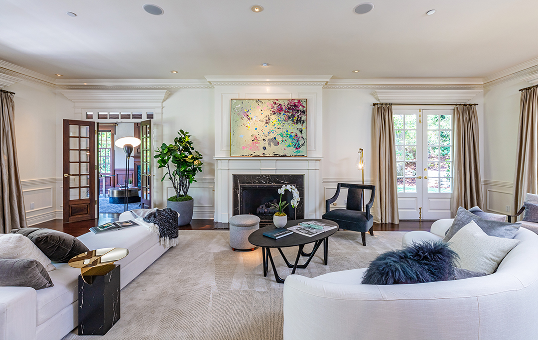 Mila Kunis And Ashton Kutcher Seek To Sell Their Traditional Beverly Hills Home Living Room