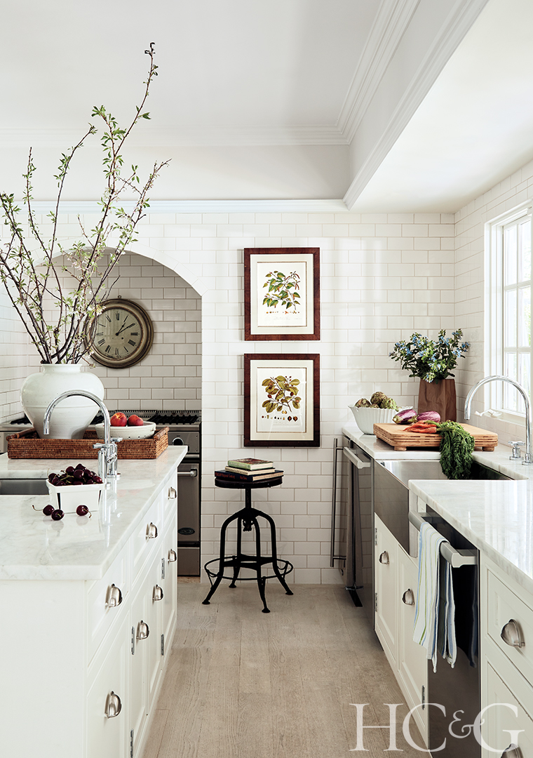 farmhouse style kitchen; white cabinets; subway tile