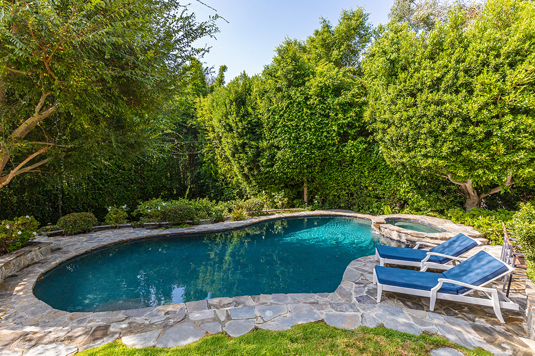 Mila Kunis And Ashton Kutcher Seek To Sell Their Traditional Beverly Hills Home Pool B