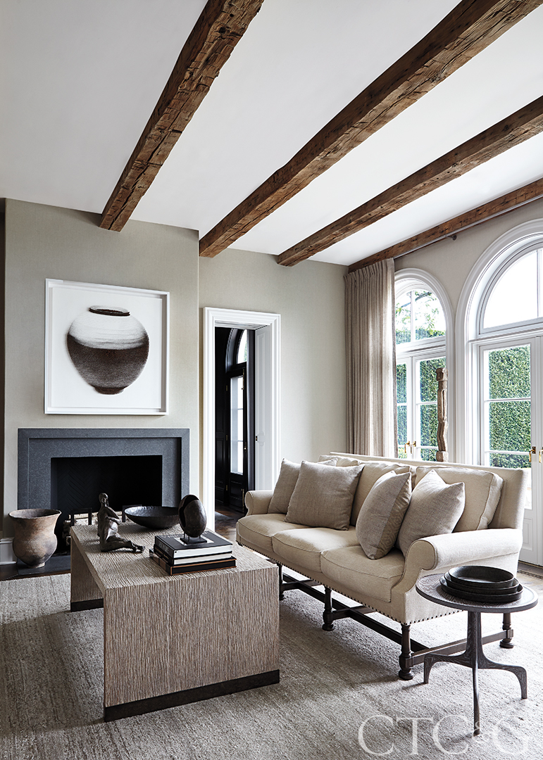 neutral palette living room with wooden ceiling beams