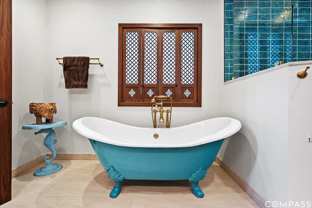 Celebrity Chef Lists Chicago Townhouse Brimming With Eclectic Style Primary Bath Blue