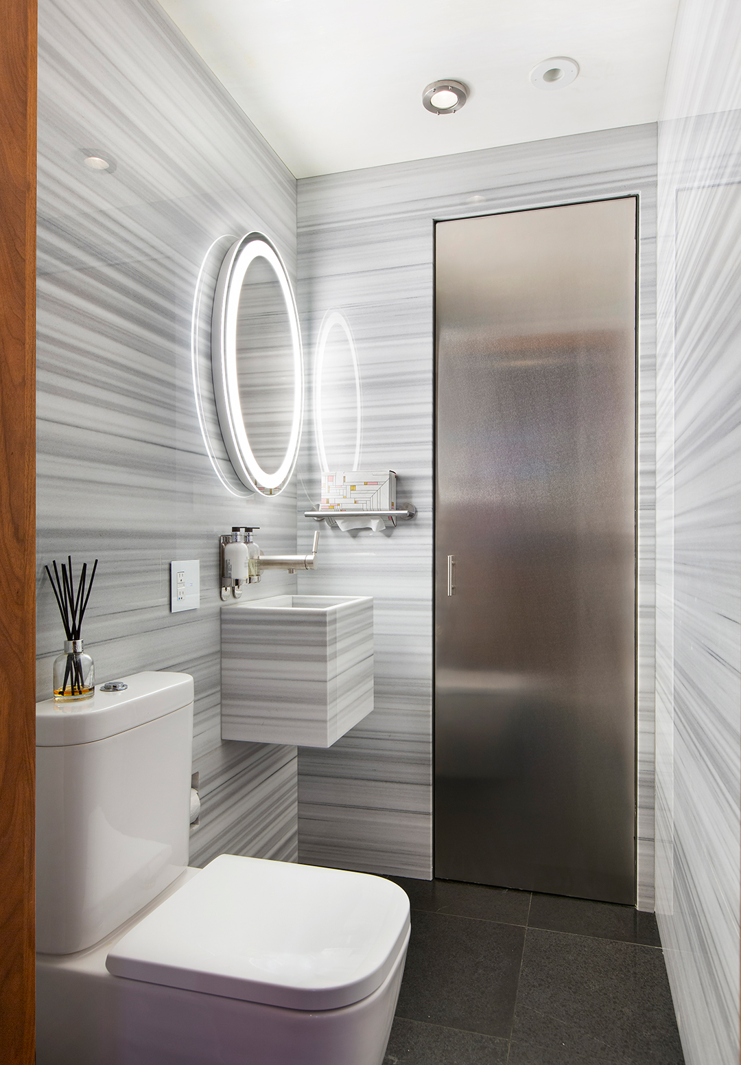 sleek bathroom design with lighting mirror
