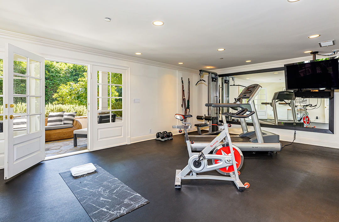 Mila Kunis And Ashton Kutcher Seek To Sell Their Traditional Beverly Hills Home Gym