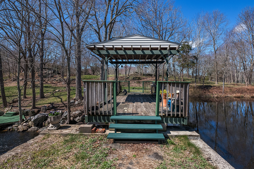 A Stone 19th Century Mill Transformed Into A Home By An Antiques Dealer Lists In Old Lyme Deck