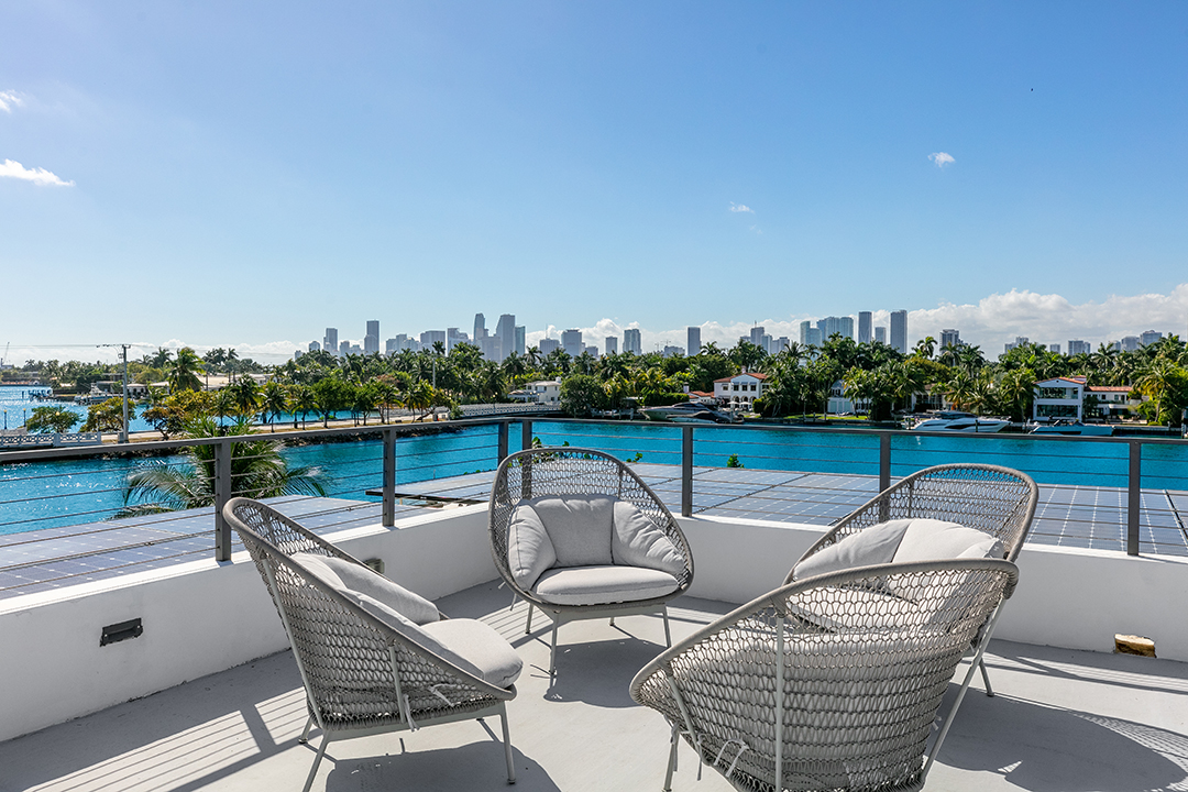 Honey Co Founder Ryan Hudson Lists A Sweet Swanky Waterfront Miami Beach Modern Rooftop 1