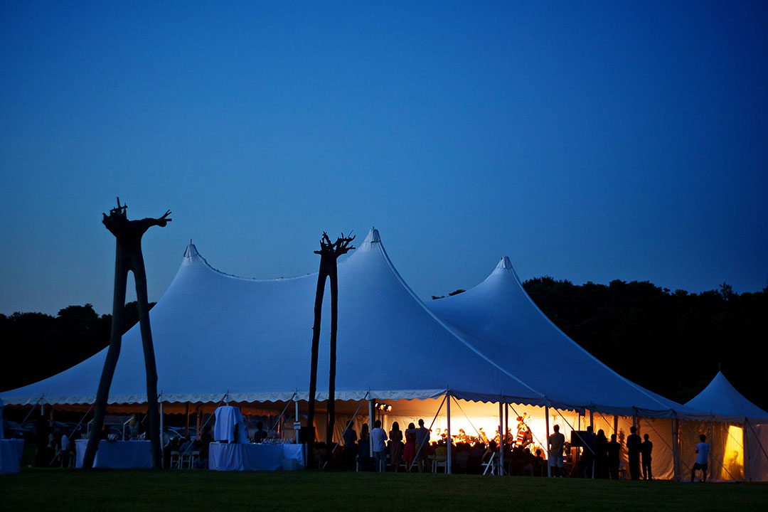 Channing Sculpture Garden Tent With Walking Trees Night