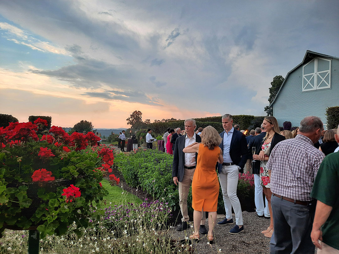 15 Guests Mingled For Cocktails In The Gardens