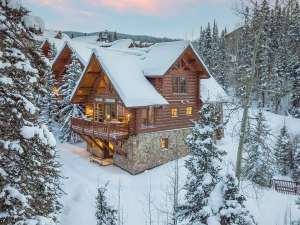 This $4M Log Cabin Perched on a Breathtaking Colorado Ski Trail Could Become Your Winter Wonderland