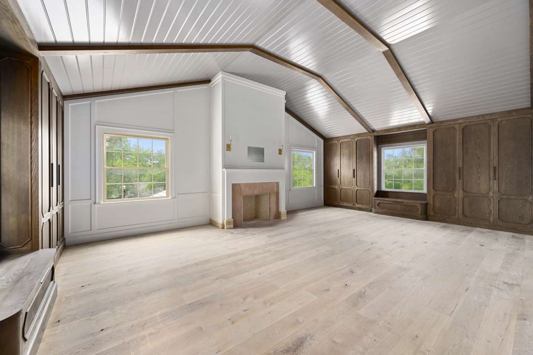 Spacious bedroom with fireplace