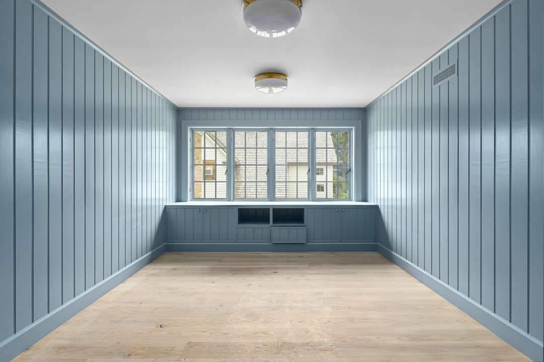 Baby blue room with window seat