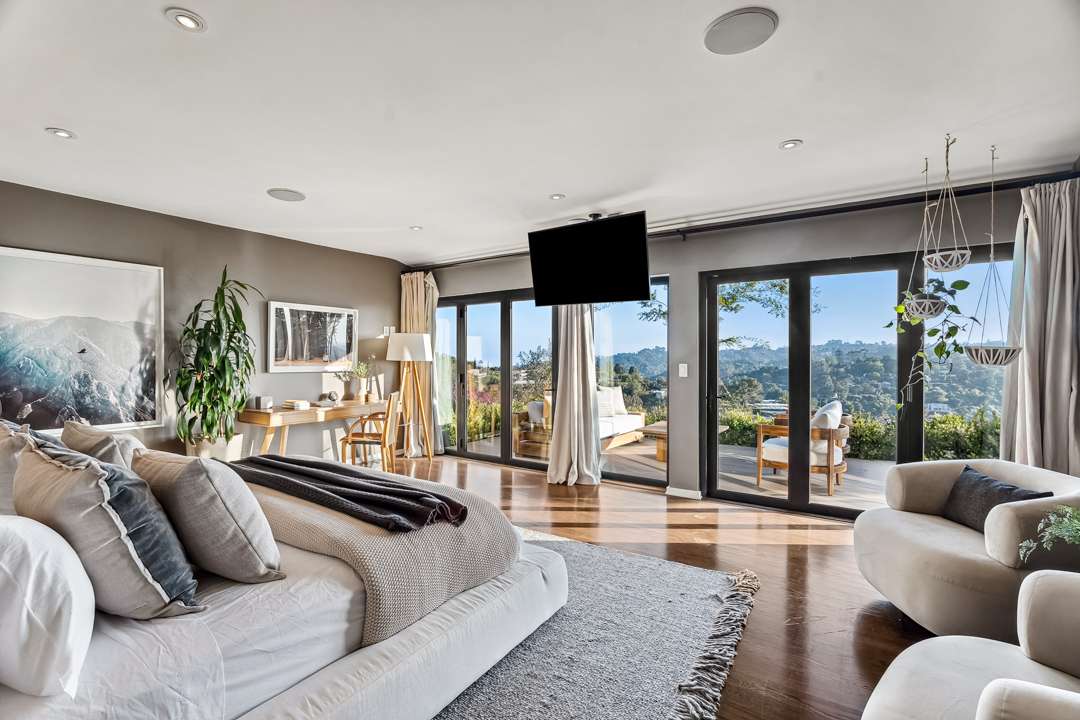Tranquil master bedroom with outdoor access