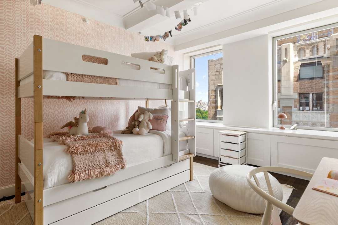 A lively kids bedroom with bunk beds