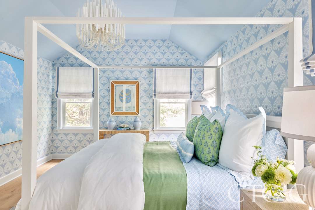 Colorful primary bedroom with square bed frame