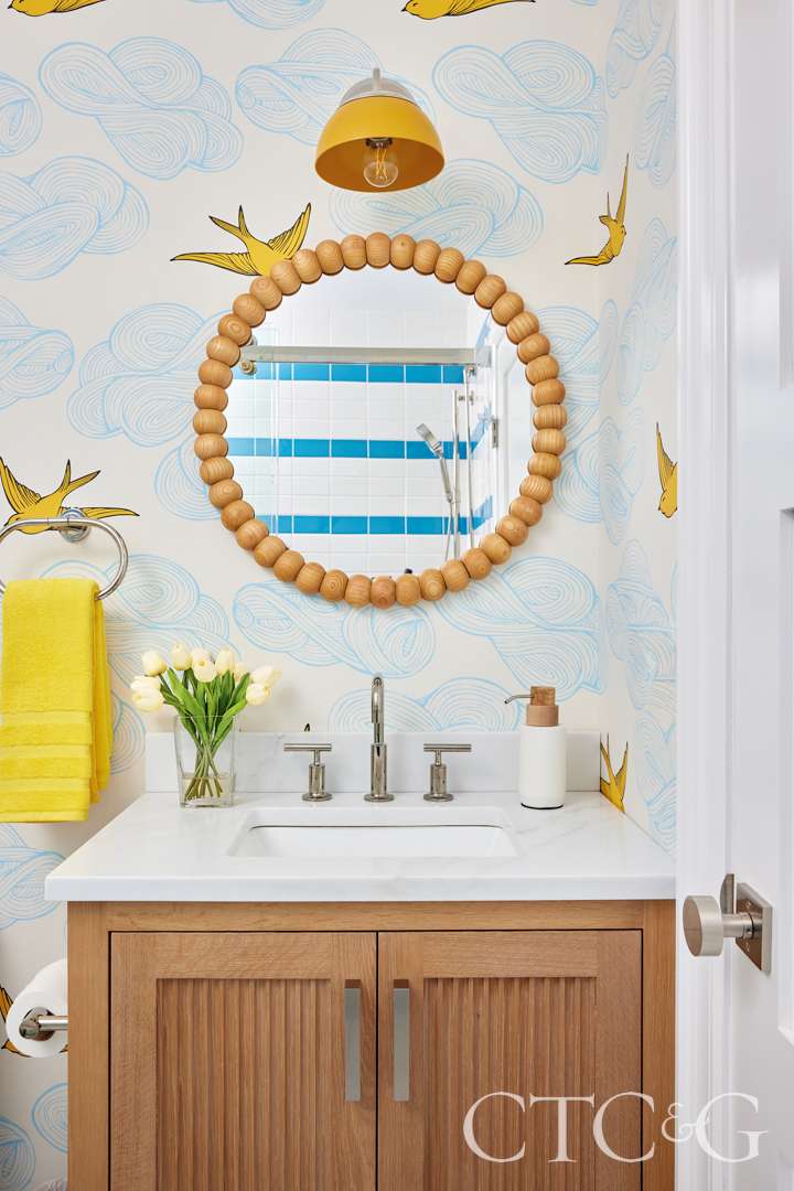 Playful bathroom with yellow accents