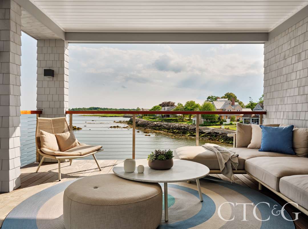 Luxurious terrace with a patterned outdoor rug
