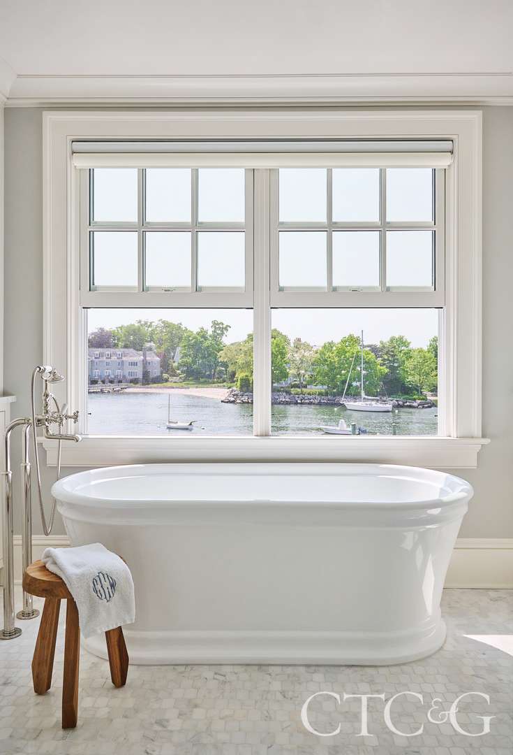 Clean bathroom with freestanding tub
