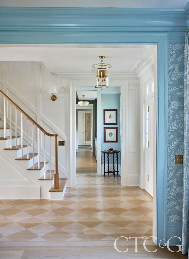 Open entryway with painted flooring