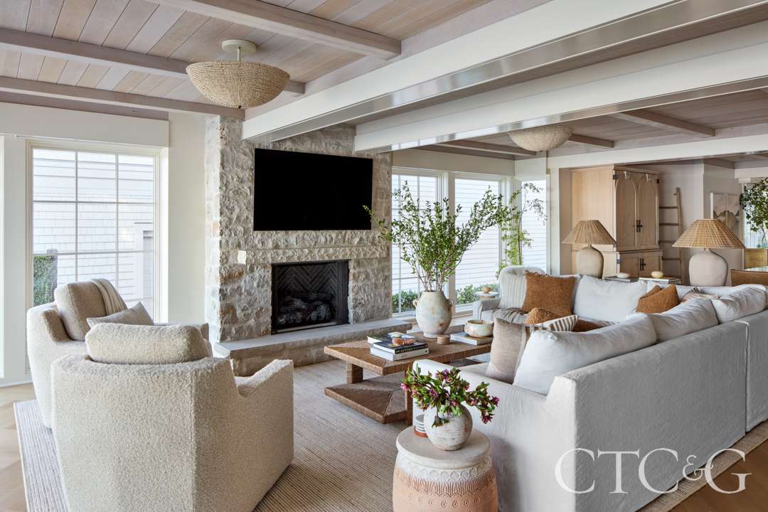 Luxurious linen sectional furnishes the living area