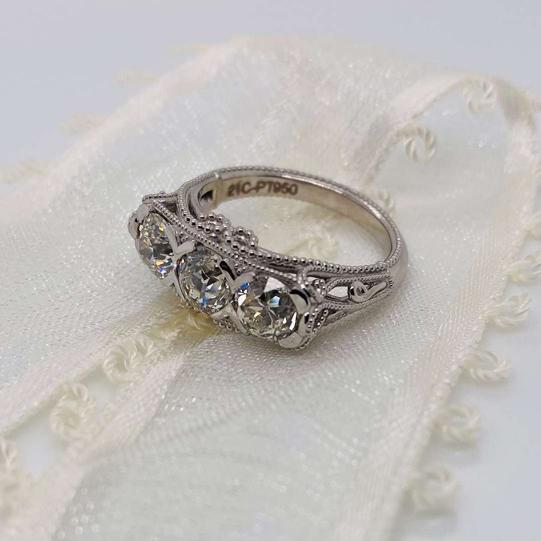 Silver ring with three primary stones