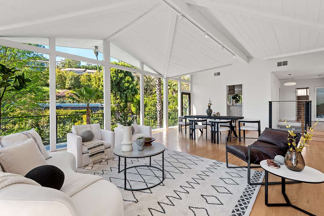 Contemporary living area with patterned rug