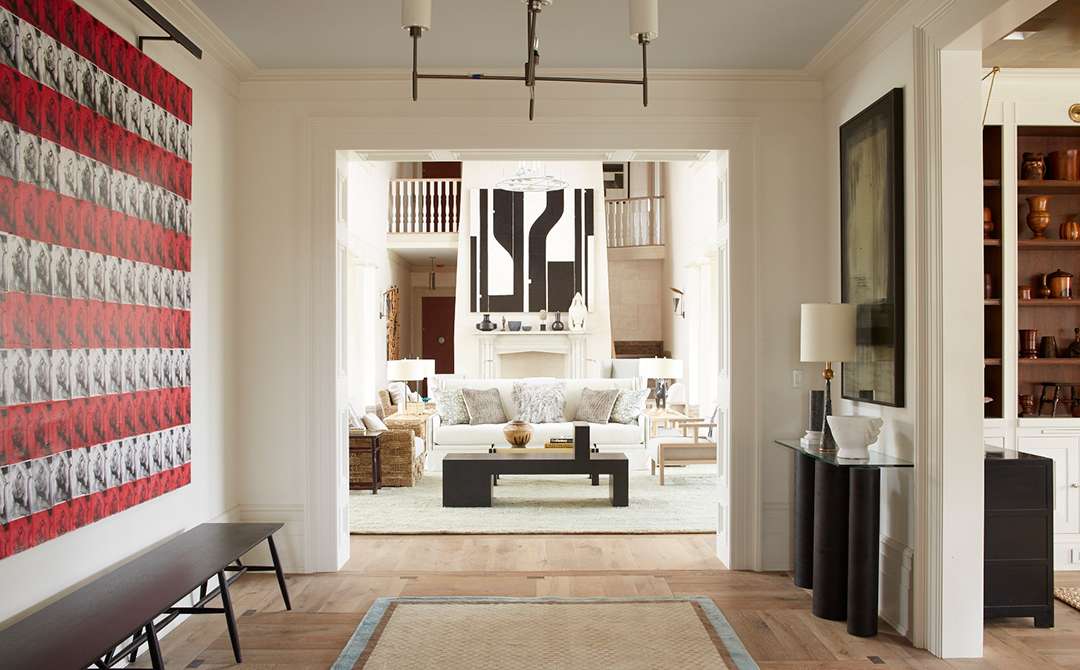 Hampton hallway with wood flooring