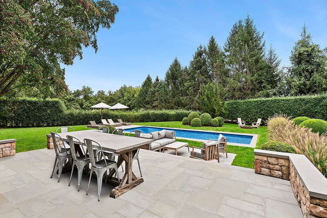 Secluded backyard with patio and pool