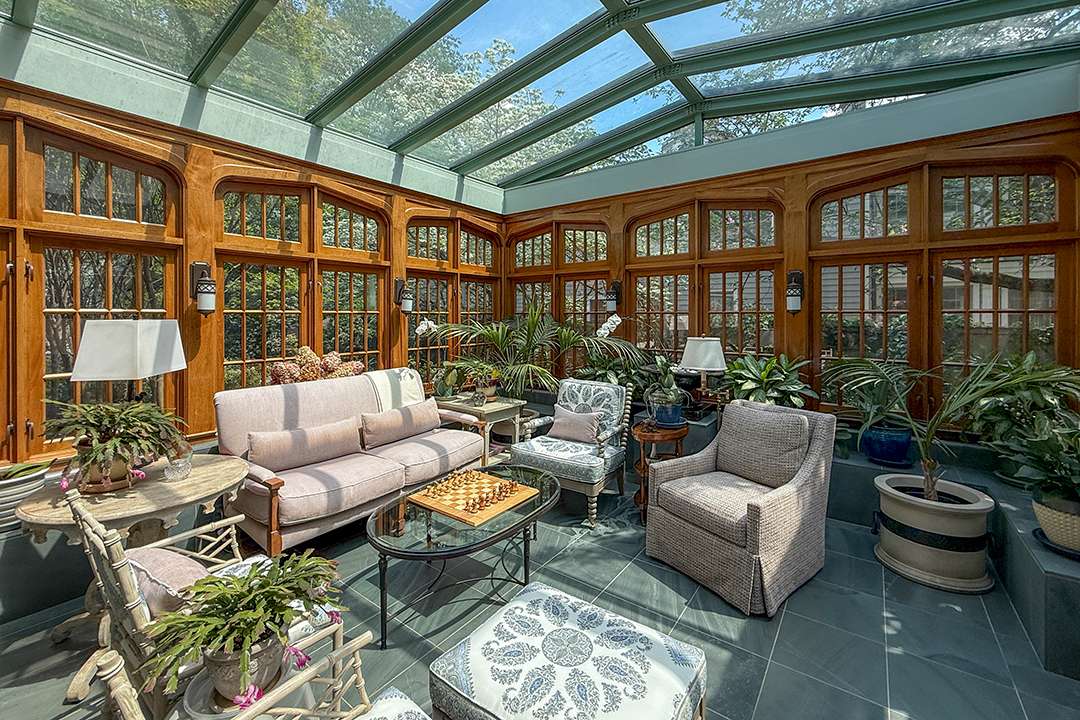 Seating area gives likeness to a greenhouse