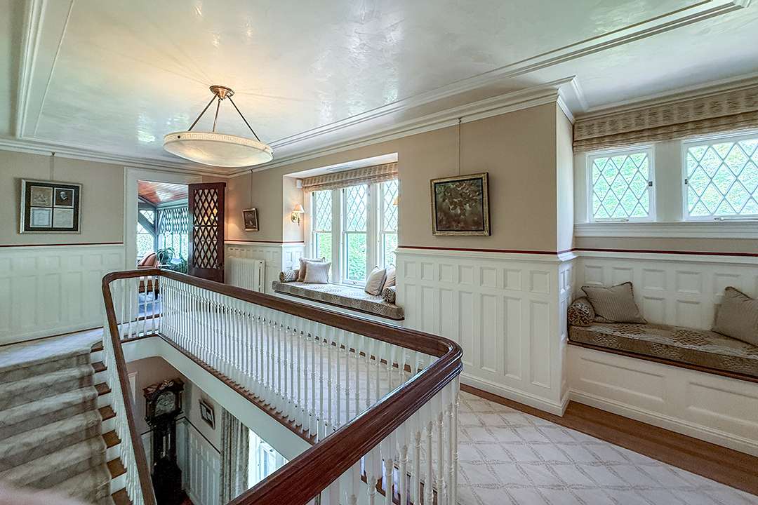 Upper hallway with built-in benches
