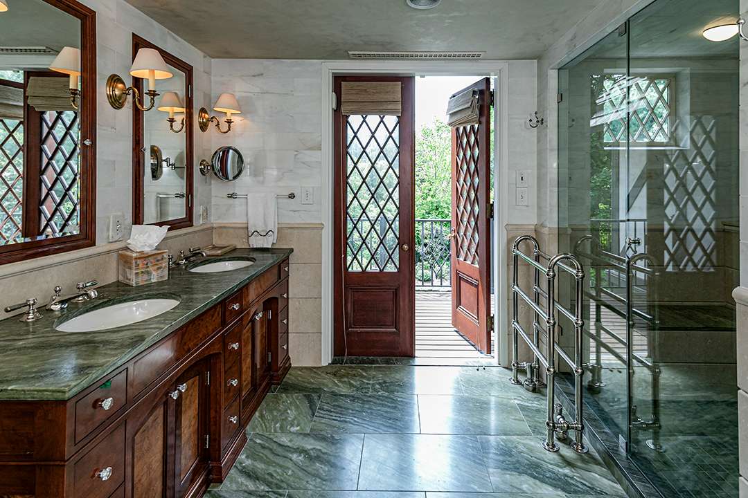 Bathroom opens to outdoor peaceful balcony