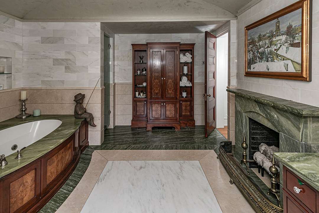 Rustic bathroom with green tile