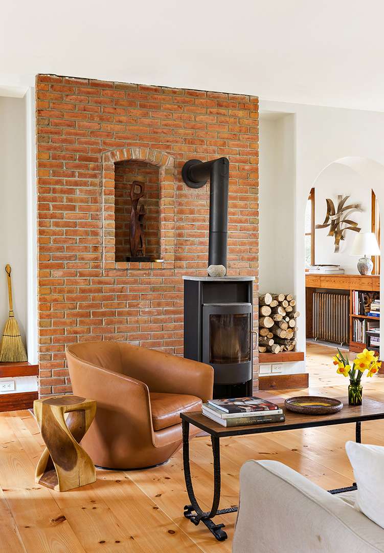 Traditional fireplace with area for logs