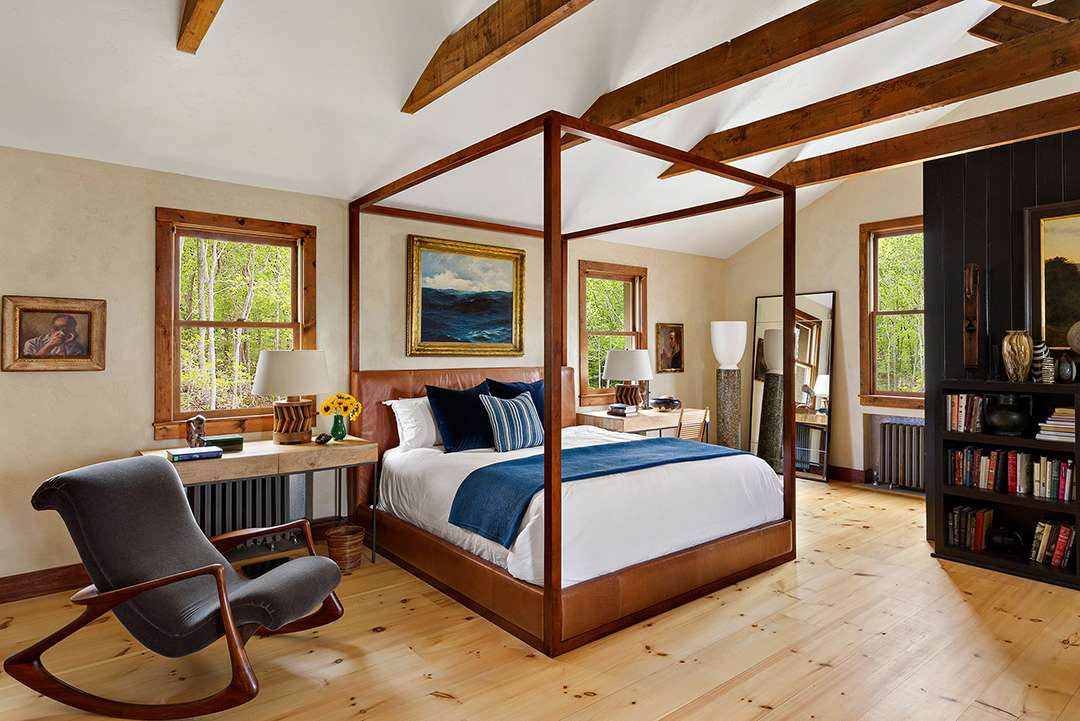 Rocking chair sits in Sag Harbor bedroom