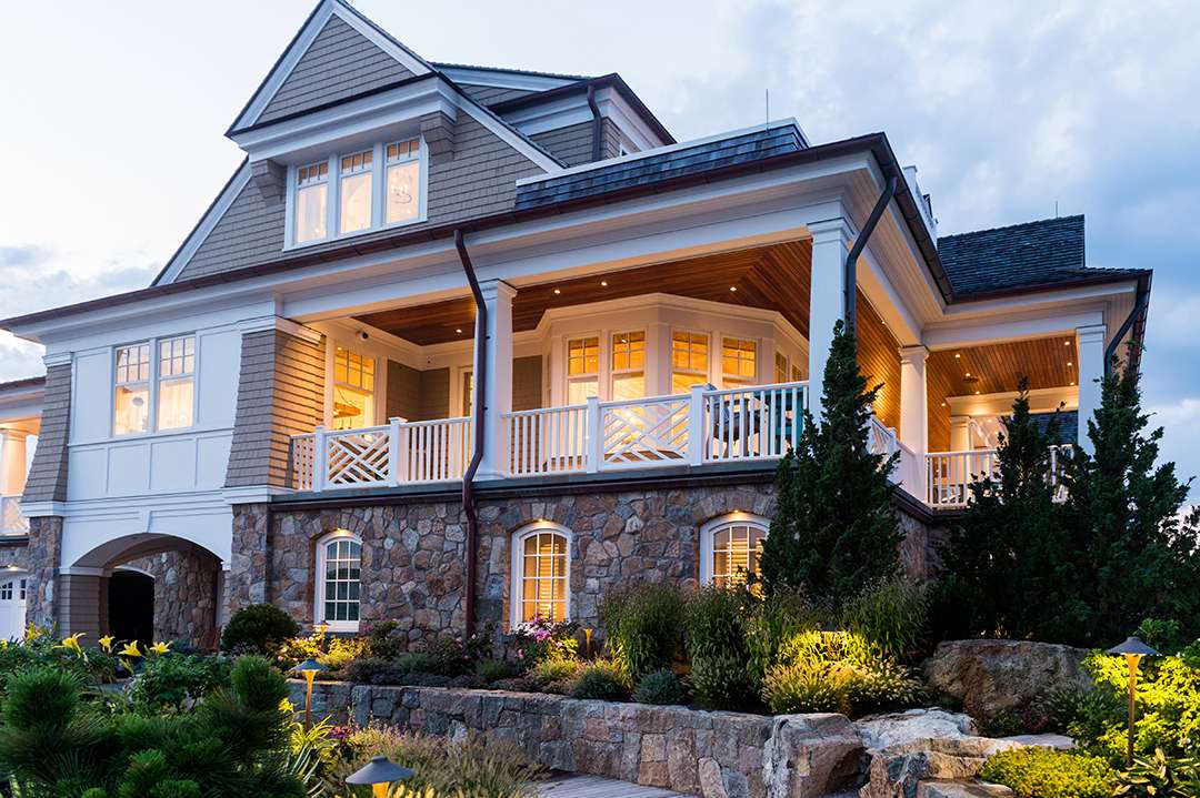 Coastal house with white and brown exterior