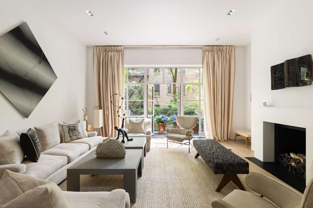 Neutral living room with black abstract art