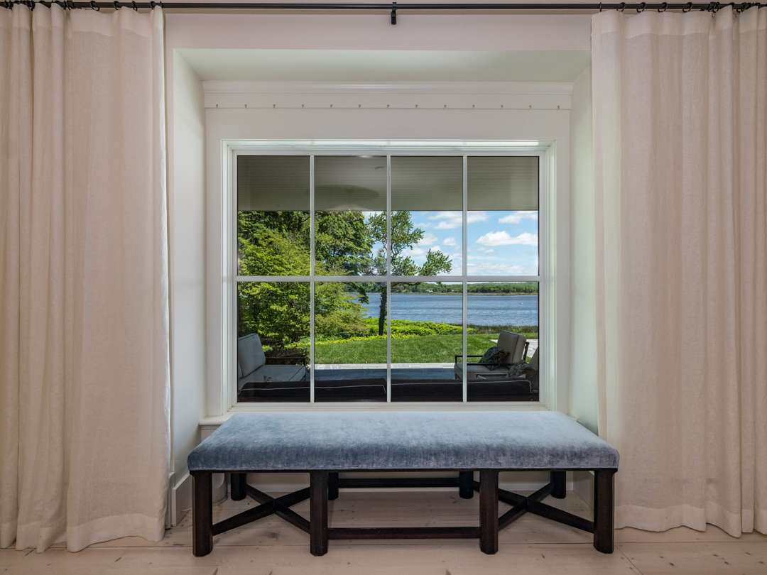 Living room blue bench overlooking river