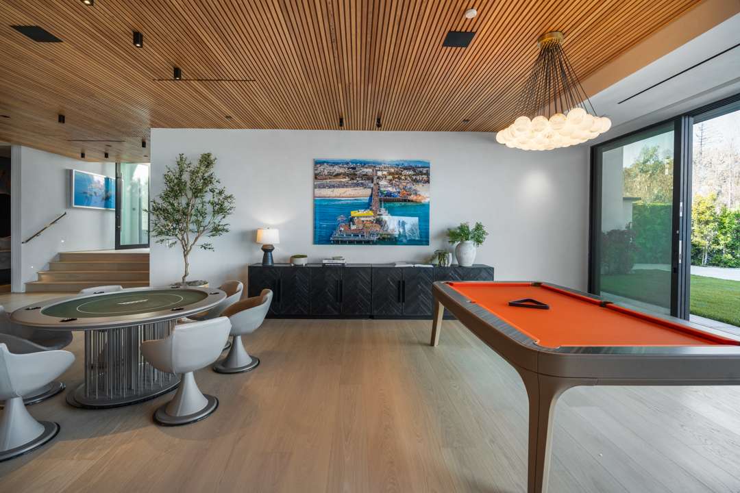 Game room with poker and pool table