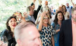 Guests toasting at Champagne on the Deck