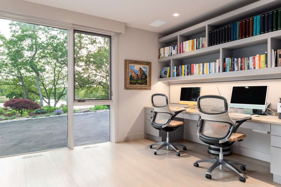 Office with sliding doors to outside