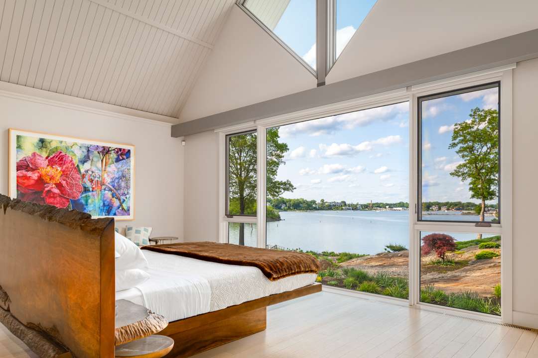 Bedroom with view of lake